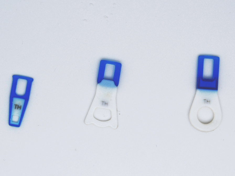 TH Zipper 3D printed blue pullers.
