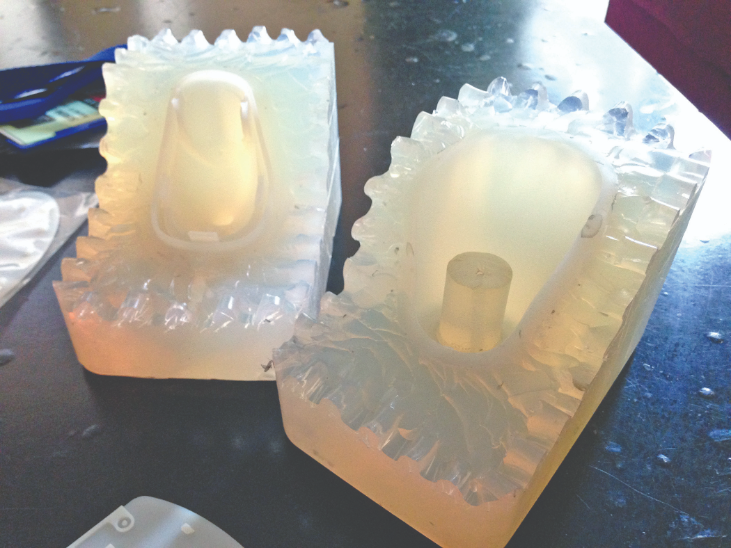 Solidify 3D printed a master part to create these silicon rubber molds for their automotive client.