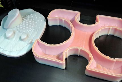 This 3D printed prototype for a swimming float was produced in full color in a mix of rigid and flexible materials, all in a single print, using the Stratasys J750 3D Printer.