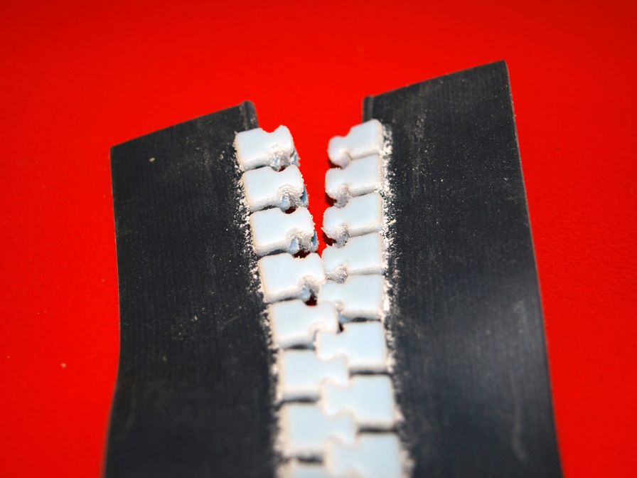 This oversized example of zipper teeth was 3D printed
on the Connex3 to demonstrate the function of a new
design concept.
