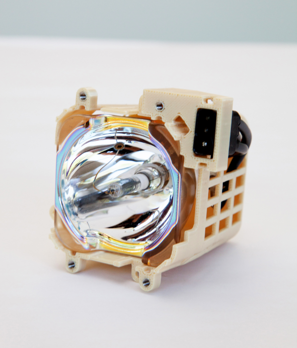 This FDM lamp assembly in ULTEM™ 9085 resin thermoplastic withstands high temperature.