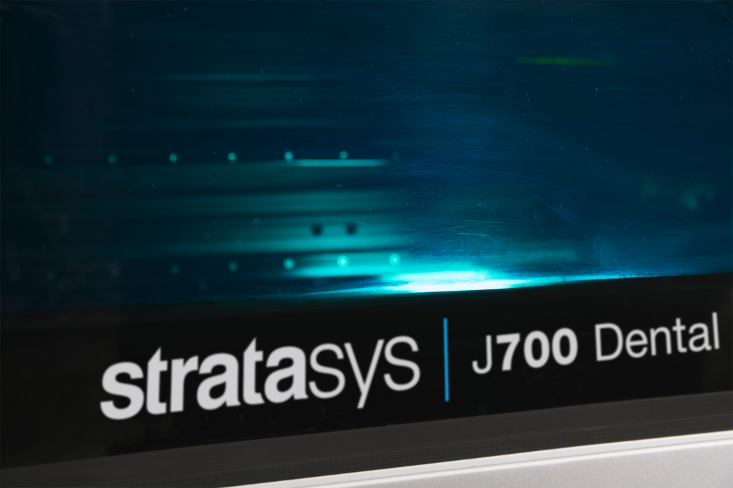 A Stratasys J700 Dental 3D printer. 