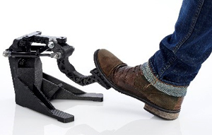 Functional prototype of an automotive brake pedal and jig assembly 3D printed in FDM Nylon 12CF material.