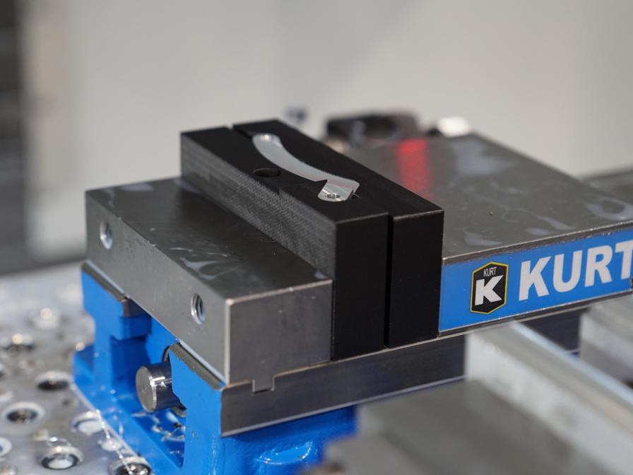 Soft jaws made from carbon fiber FDM Nylon 12CF alleviate the tooling load, allowing CNC machines to produce value-added parts.