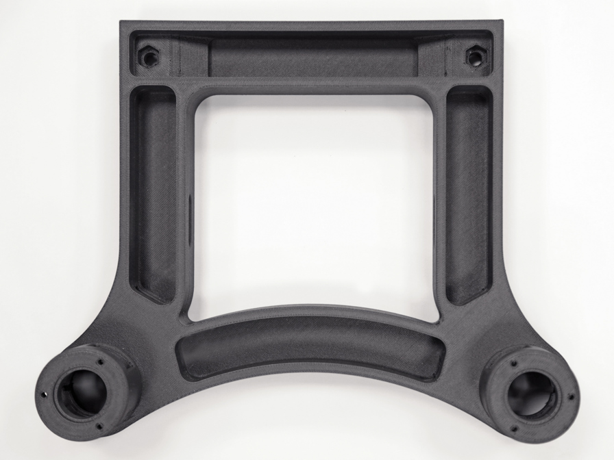 3D printed component used for product handling on the robotic packaging system. Produced using FDM Nylon 12CF material.