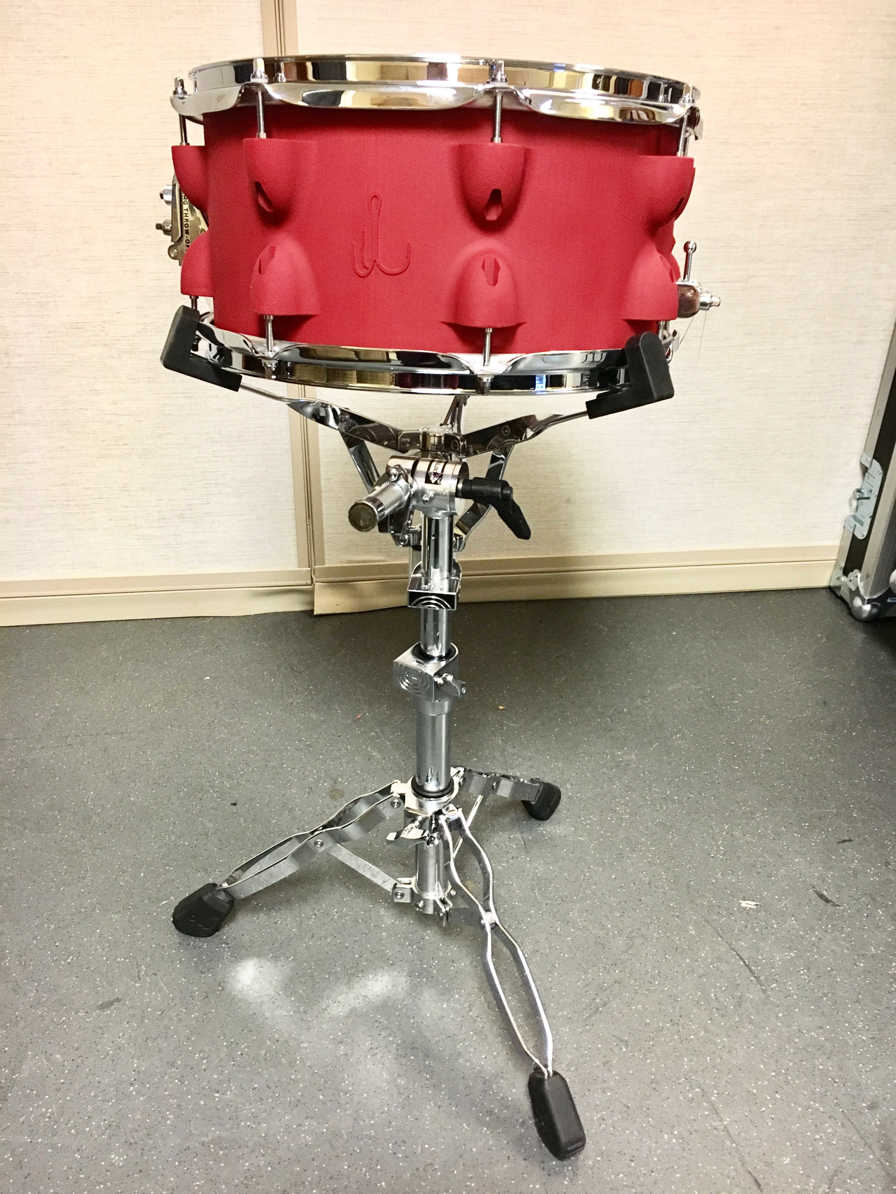 a red 3d printed snare drum