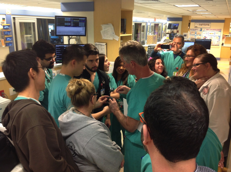 Surgeon in meeting with other doctors 