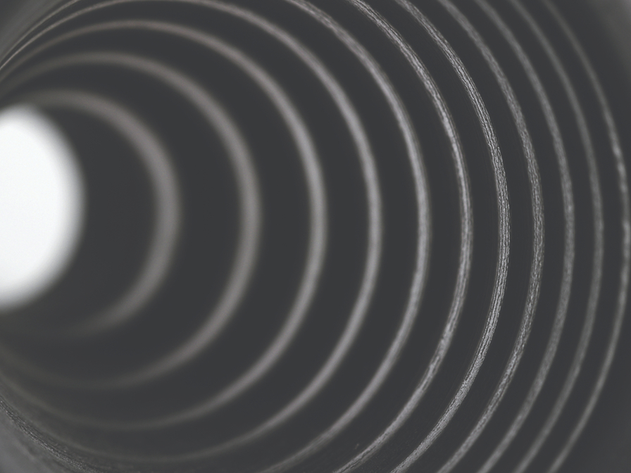 an extreme closeup of a 3d printed part showing circular rings