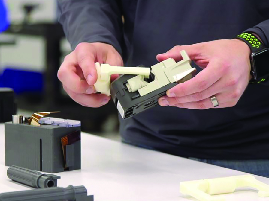 Several of CSI’s 3D printed manufacturing aids