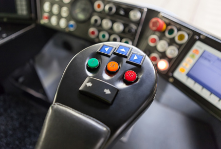 3D printed armrest with three extra buttons for the control system.