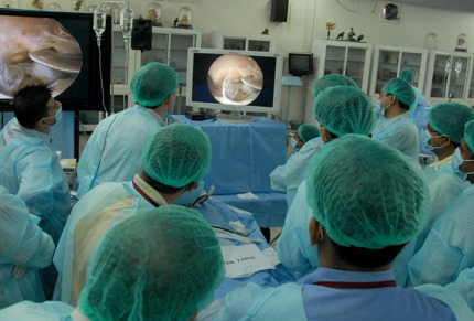A team of Trainee neurosurgeons in the operating room