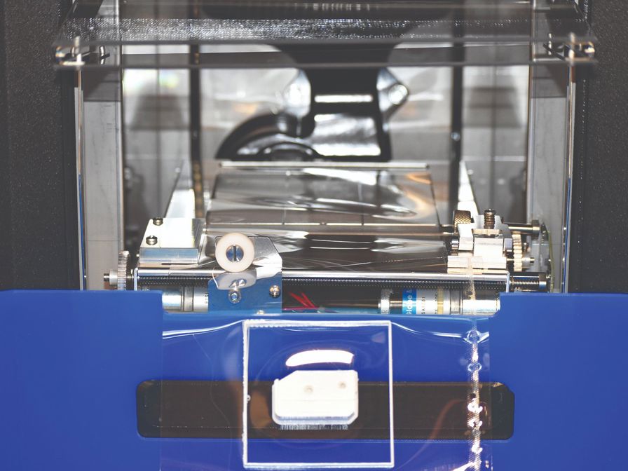 A part produced with the Continuous Build
Demonstrator being ejected into the catch bin.