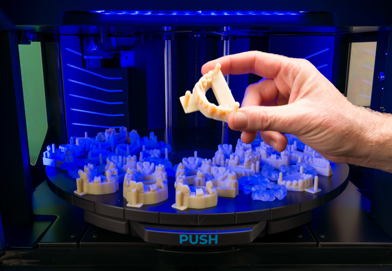 hand holding Bio tray mode