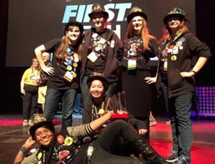 Iron Maidens from Apple Valley, Minnesota, the young and very talented winners of the competition, in a victory pose.