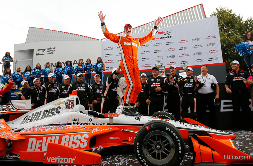 Josef Newgarden, Team Penske Chevrolet celebrates the win in victory lane.