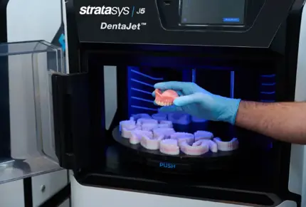 j5 dentajet hand holding truedent denture