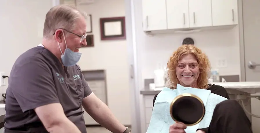 dentist-with-happy-denture