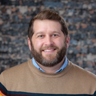 Portrait of Benjamin Cox Co-founder of Phantech wearing a sweater.