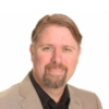 Teddy Tedford, experienced additive manufacturing specialist and account manager at Stratasys Direct, with over 20 years at Stratasys supporting customers through technical training, application support, and global shop floor consultations.