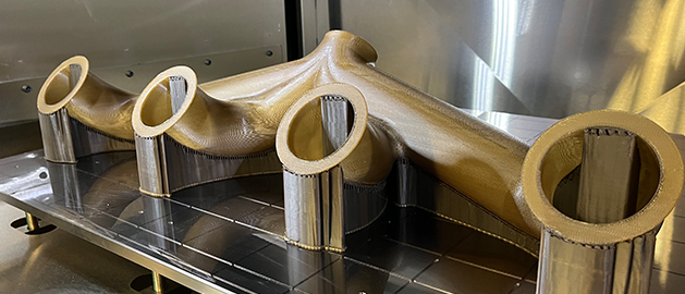 Large scale 3D printed FDM ducting on build tray